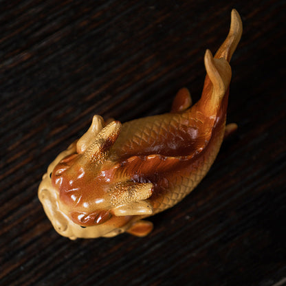 Karpfen springendes Teehaustier