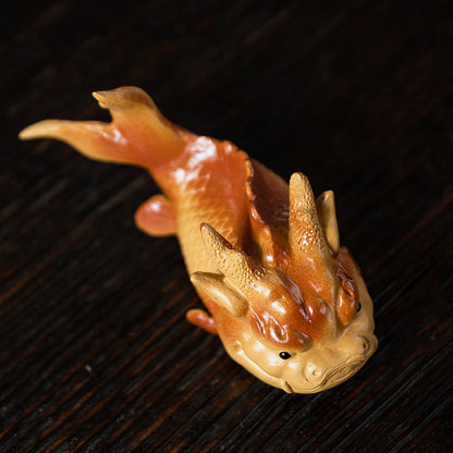 Karpfen springendes Teehaustier