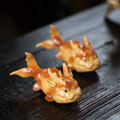 Karpfen springendes Teehaustier