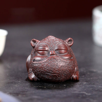 Goldschluckendes Tier Teehaustier