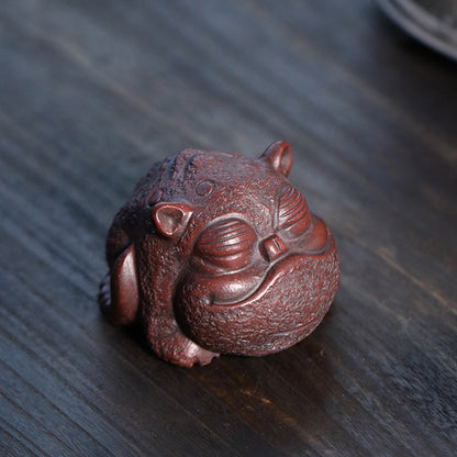 Goldschluckendes Tier Teehaustier