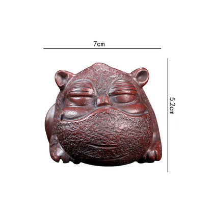 Goldschluckendes Tier Teehaustier